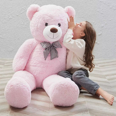 Ours en peluche géant - douceur Câline, le confident parfait des petites mains curieuses.