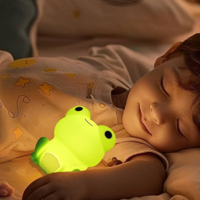 Veilleuse bébé grenouille pour un sommeil profond.