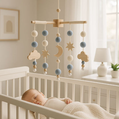 Mobile suspendu au-dessus du berceau de bébé l'accompagnant dans son sommeil